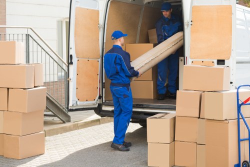 Office relocation planning in Ruislip with boxed equipment and moving supplies