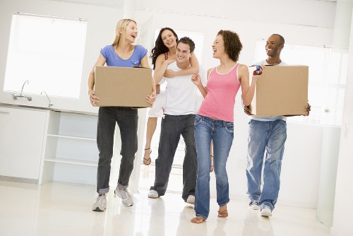 Careful loading of student furniture and boxes in a Ruislip street