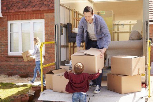 Team preparing items safely for a man and van move