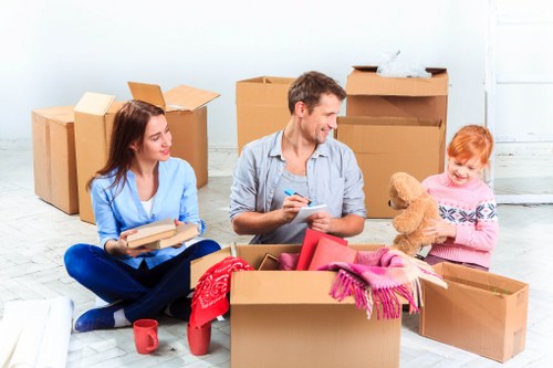 Commercial movers transporting office furniture and equipment in Ruislip