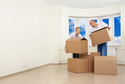 Local Ruislip moving team handling furniture with care