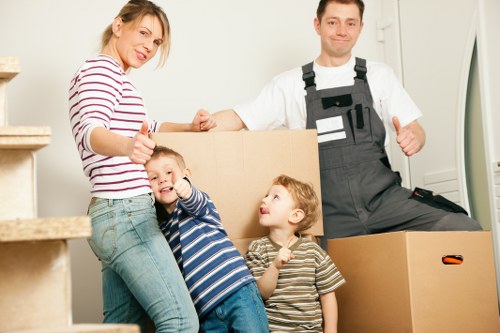 Furniture and boxes being transported by a man with a van